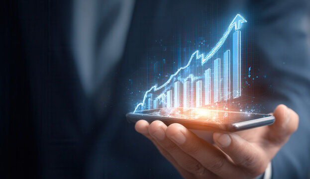 Business professional holding smartphone with financial growth graph overlay in a modern office setting