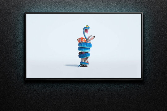 Zootopia 2 trailer or movie on TV screen. TV on black textured wall. Astana, Kazakhstan - July 17, 2025.