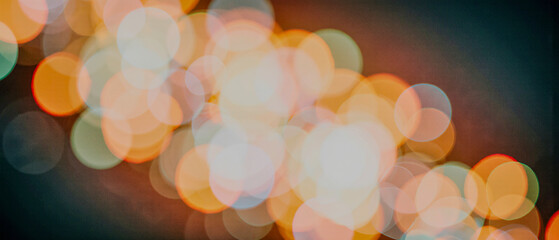 Colorful bokeh lights blurred into soft circles.