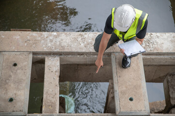 Environmental scientists are examining drainage channels around the city.