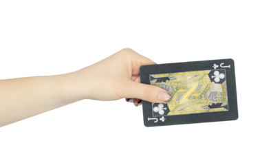 playing card clubs jack in hand, outstretched hand with black playing card isolated from background