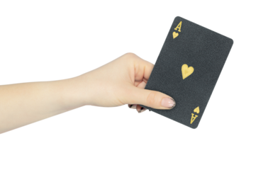 playing card hearts ace in hand, outstretched hand with black playing card isolated from background