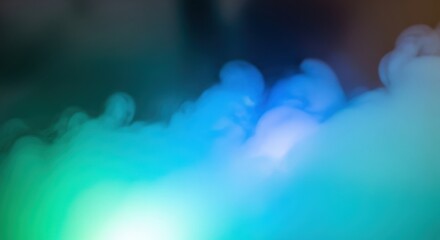 Abstract colorful smoke background vibrant blue and green fog perfect for atmospheric effects or product photography