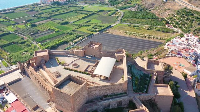 Aerial 4K video from drone to Salobre&ntilde;a Castle and the city of Salobrena, mountains and sea in the background. Spain Andalusia