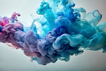 Vibrant swirls of blue pink and purple ink underwater