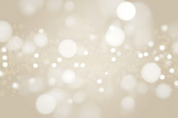 Soft focus background with glowing white and gold bokeh lights for festive celebrations