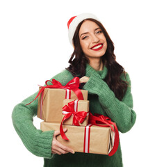 Happy woman wearing Santa hat with Christmas gifts on white background
