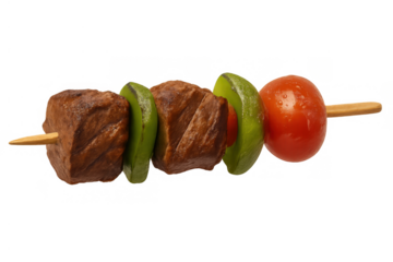 Grilled kebab skewer with seasoned beef, green bell pepper, and tomato on transparent background, fresh cooked food