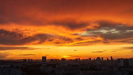 Dawn clouds over the metropolis of early winter sunset 3