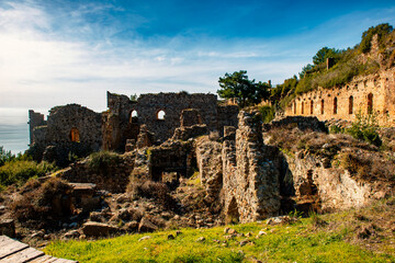 Fototapeta premium The ancient city of Syedra has located about 20 km. southeast of Alanya district of Antalya, on a mountainous area just west of the small coastal plain fed by the Sedre Stream. The city has developed 