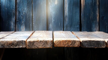 A rustic, weathered wooden shelf sits in front of a dark blue wooden plank wall, with shafts of light illuminating the scene.