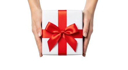 Hands holding a white gift box with a red ribbon bow, isolated on transparent background