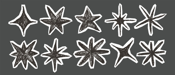 Doodle starburst and star paper cutout in irregular scrapbook set. Stars shape hand drawn in chalk. Doodle star sketch drawing. Design elements © Svetlana