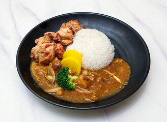 Enjoy a flavorful meal with this delicious Japanese chicken curry. The perfect combination of rice and vegetables is sure to satisfy your cravings.