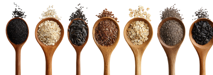 Wooden spoons holding various grains