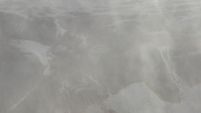 Aerial view of a serene landscape, where soft, muted tones blend seamlessly across the terrain, creating a tranquil scene, Skaftarhreppur, Iceland.