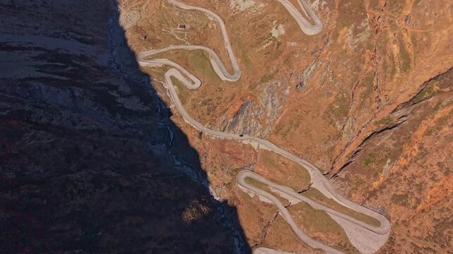 Iconic hairpin turns of Tremola Road seen from high altitude, Switzerland.