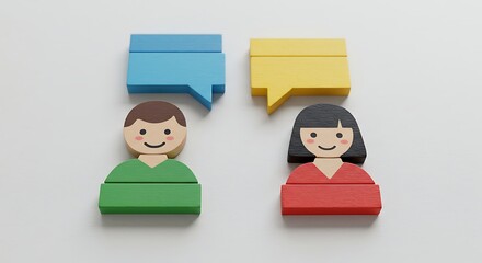 Wooden Figures with Speech Bubbles Representing Communication and Social Interaction
