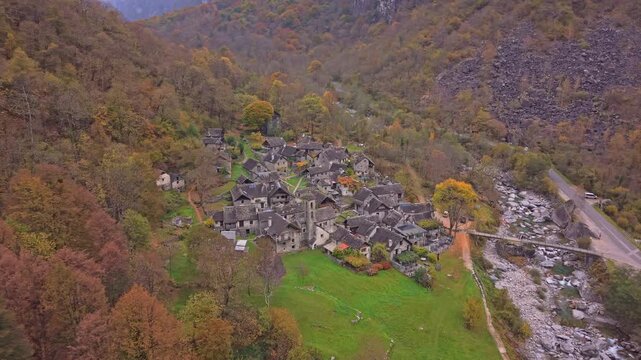 Foroglio village nestled in Val Bavona with fall foliage, Switzerland.