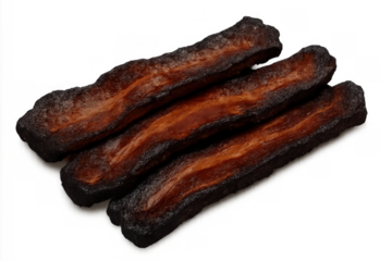 Burnt bacon strips overcooking to a crisp, showing charred, inedible food for breakfast, transparent background