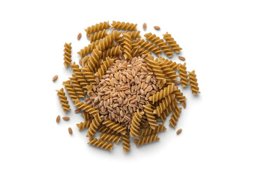 Whole wheat pasta fusilli and grains isolated on white background close up shot
