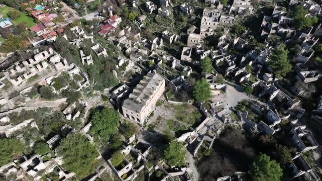 Aerial view of the ancient Kayak&ouml;y village showing abandoned stone houses and historical ruins