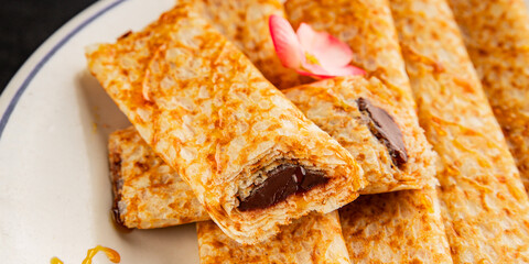 Crepes with chocolate sweet dessert tasty snackfresh gourmet food background on the table  rustic food top view copy space