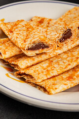 Crepes with chocolate sweet dessert tasty snackfresh gourmet food background on the table  rustic food top view copy space