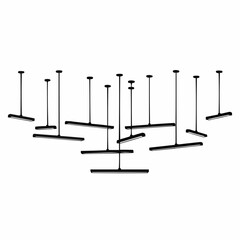 A modern installation of minimalist black T-shaped pendant lights.