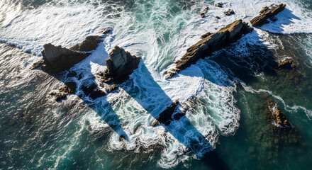 Aerial Seascape With White Waves Crashing Against Rocky Cliffs Scenic View of Coastal Waters Ocean Splashing Around Jagged Rocks From Above Seascape Marine Beauty From Birds Eye View