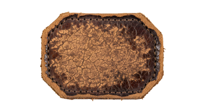 Brown leather shows cracked texture and decorative stitching; use for background, vintage designs, or mockups.