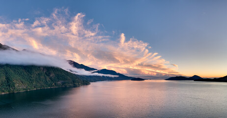 Sunset Over Coastal Mountains and Calm Water in British Columbia, Canada