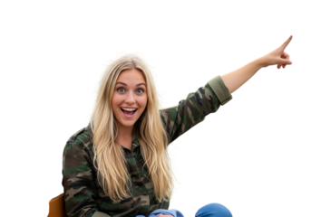 a surprised young woman with blonde hair pointing to the right wearing a camo shirt and jeans smiling and looking excited on transparent