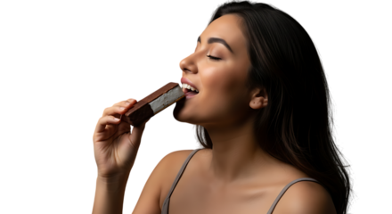 a beautiful young woman with dark hair enjoys a delicious chocolate covered ice cream bar with her eyes closed on transparent background