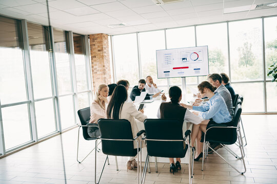 Diverse group of professionals people collaborating during an office meeting