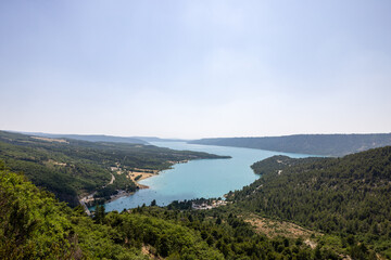 The Lake of Sainte-Croix with the Pont du Galetas seen from the outlet of the Verdon Gorge. Alpes-de-Haute-Provence, France