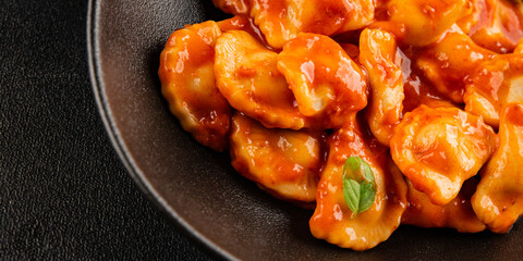 Beef ravioli tomato sauce main course tasty snack fresh delicious gourmet food on the table rustic food top view copy space