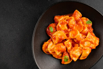 Beef ravioli tomato sauce main course tasty snack fresh delicious gourmet food on the table rustic food top view copy space