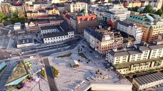 Stockholm, Sweden - 27 July 2025: Aerial view of Slussen and surrounding buildings, showing the colorful architecture against the blue sky.