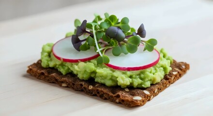 Rustic rye tartine topped with avocado for healthy plant-based appetizer and mindful eating inspiration