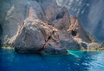Rocks and waters of the Mediterranean in the fantastic Scandola Nature Reserve in Corsica, France
