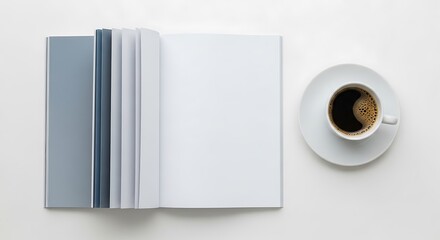 Top view of an open blank notebook or book with a cup of black coffee on a white table, isolated on white background