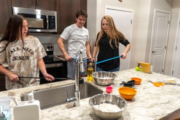 Enjoying Family Baking Fun Together in a Modern Kitchen Space