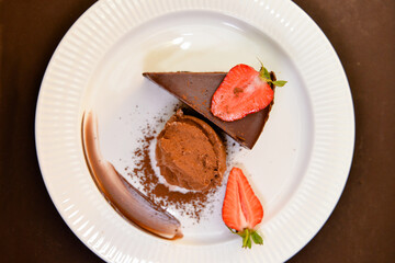 Piece of chocolate brownie cake. Delicious homemade dessert.