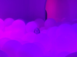 Mystical Purple Balloon Installation in Dreamy Atmosphere