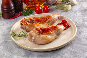 Roasted rabbit leg served rosemary
