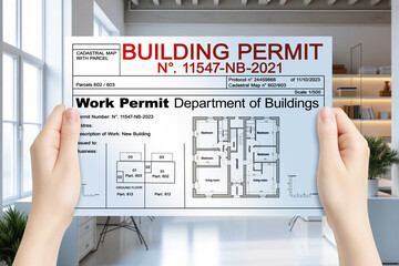 HANDS HOLDING AN IMAGINARY BUILDING PERMIT - concept with a single-family house project and acceptance of the work permit with issuance of the license