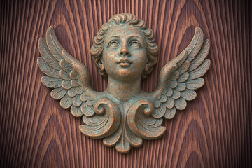 Obraz premium BRONZE CHERUB ANGEL SCULPTURE WITH WINGS ON WOODEN BACKGROUND. Ornate classical relief statue with patina metal wings, vintage decorative religious art on textured wood panel