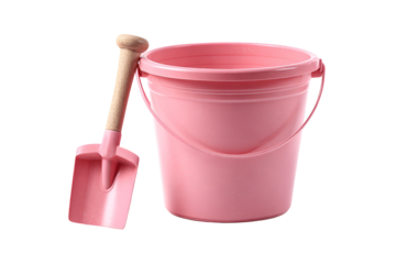 Pink plastic beach bucket and shovel isolated on transparent background