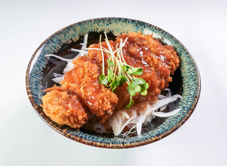 Japanese Tonkatsu Plum cutlet, perfectly plated with fresh sprouts. Ideal for menus, blogs, and culinary projects.